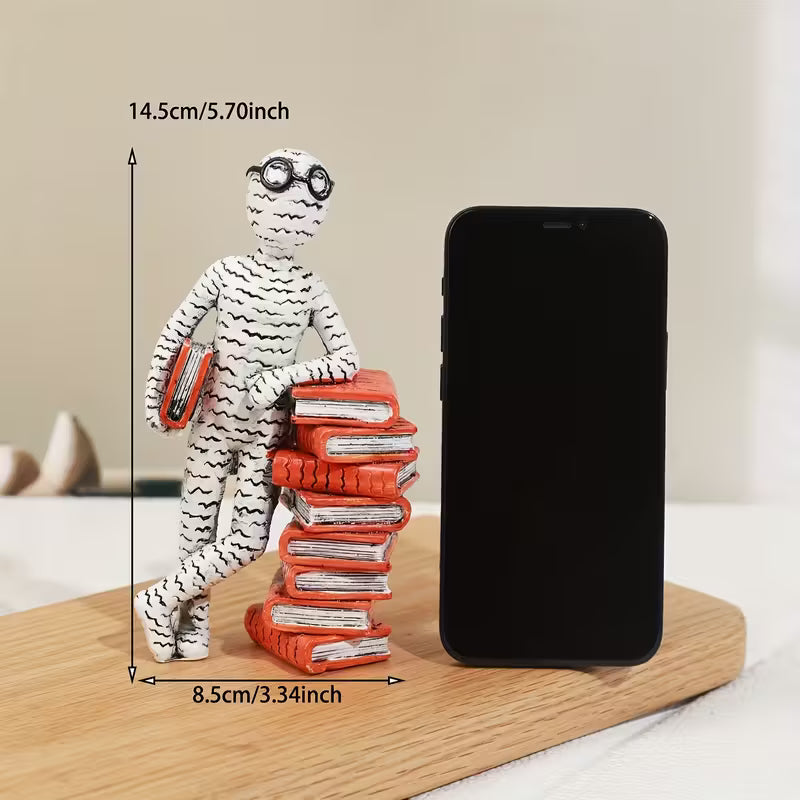 The Newsprint Reader Figurine