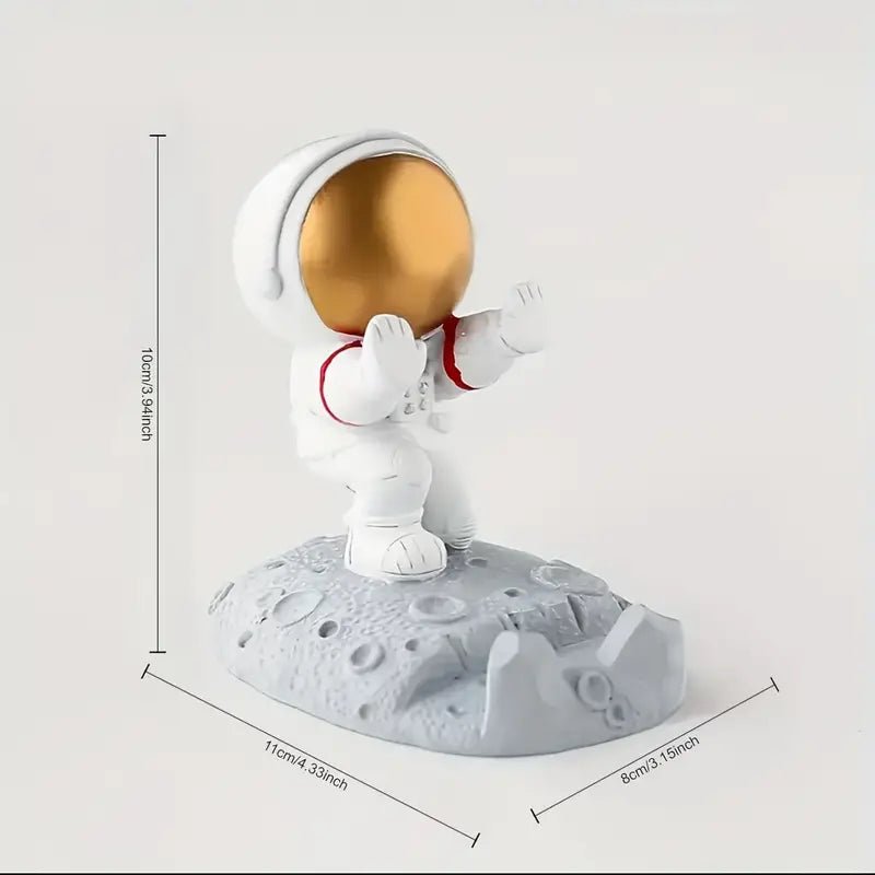 Kneeling Astronaut Cellphone Holder - The Bookstore