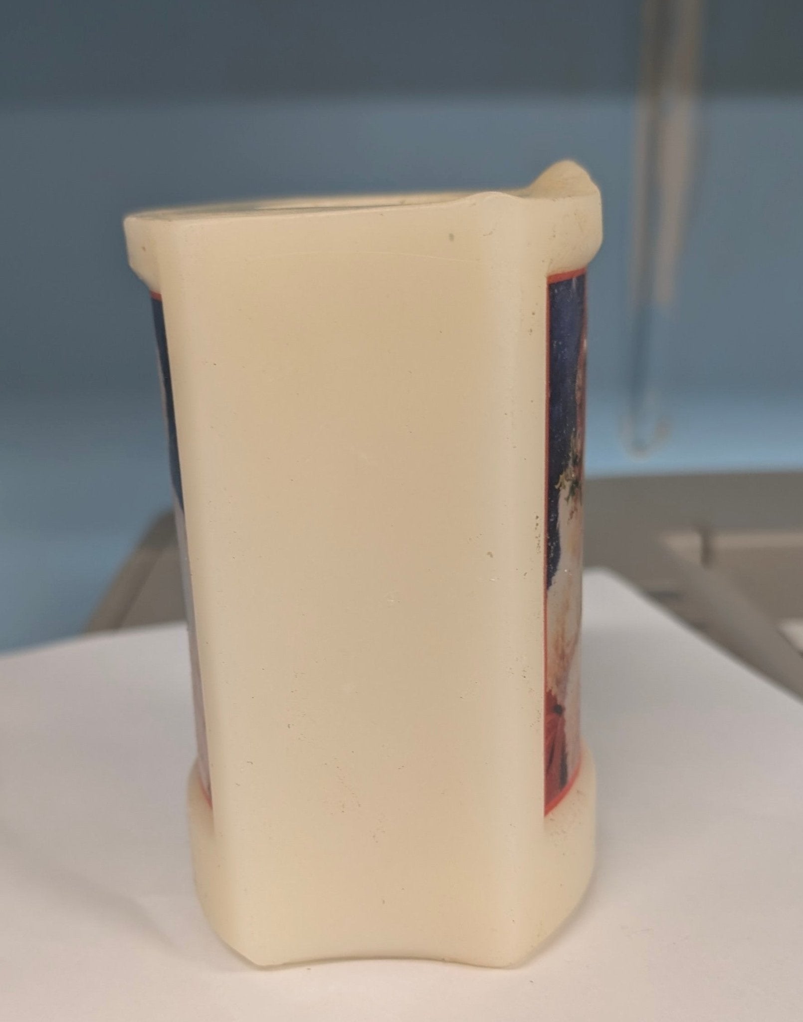 Dona Gelsinger Santa Christmas Candle - The Bookstore