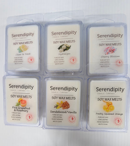 Six packages of Serendipity Soy Wax Melts on a white background