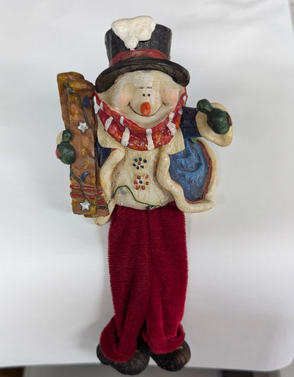 Snowman with Skis Shelf Sitter - Festive Resin Figurine with Red Velvet Legs - The Bookstore