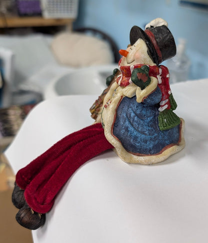Snowman with Skis Shelf Sitter - Festive Resin Figurine with Red Velvet Legs - The Bookstore