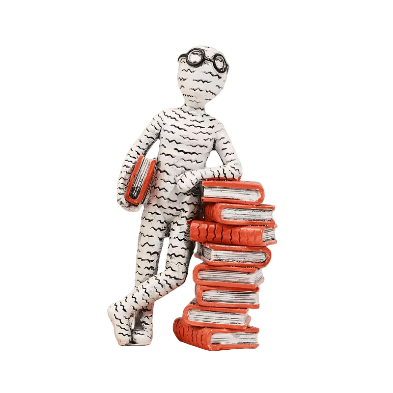 The Newsprint Reader Figurine - The Bookstore